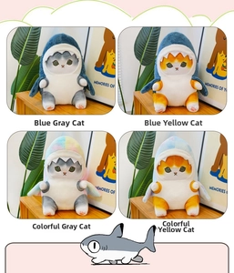 Detail of shark-clad cat plush toys in four colors with cute paw prints on bright decor
