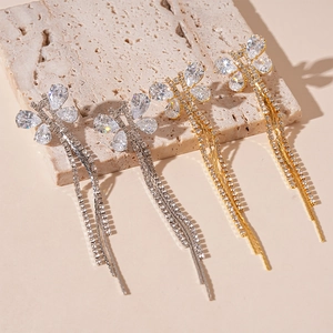 Elegant butterfly tassel earrings with sparkling zircon crystals and shiny metal fringe