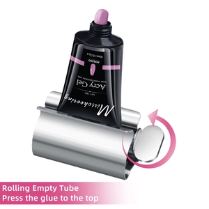 Macro view of silver stainless steel metal tube squeezer for acrylic nail gel tubes