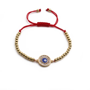 Bracciale occhio malocchio rosso regolabile con perline placcate oro e ciondolo blu