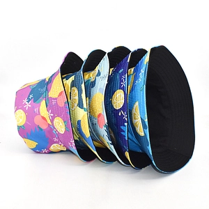 Set of five reversible summer bucket hats with lemon and floral prints for sun protection