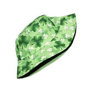 Detail of green bucket hat with shamrock pattern and reinforced stitching on brim