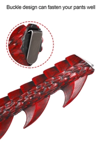 Detail of red and black dragon tail with metal buckle for secure fastening
