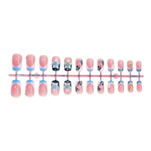 French blue and black press-on nails with 3D floral art, pearls, and glitter accents