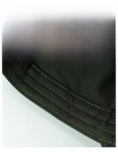Detail view of wide sweatband with reinforced stitching on camouflage flat top cap