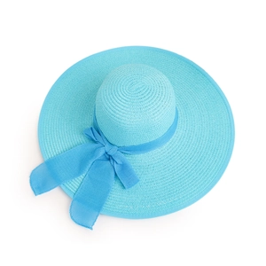 Detail of light blue woven sun hat featuring a sheer matching bow and textured brim