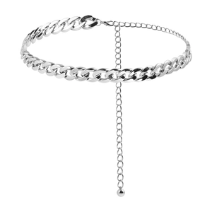 Close-up of silver chunky curb chain waist belt with adjustable link and sphere pendant