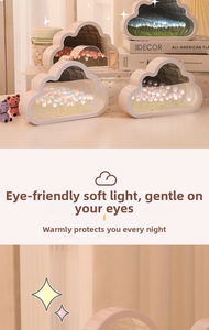 Macro view of cloud tulip night light showing mirror reflection and warm floral depth