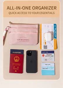 Pink multi-layer travel passport organizer with hand strap and waterproof fabric