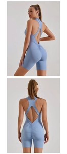 Detail of light blue yoga romper showing back cutout and scrunch butt lifting texture
