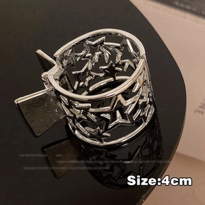 Modern 4cm silver star cutout metal hair claw clip with a reflective metallic finish