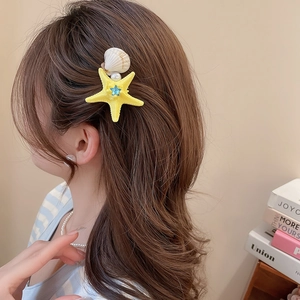 Starfish hair clip with pearls on hair, beach vacation style side accessory for women