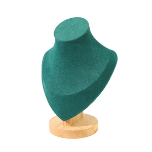 Professional dark green fabric necklace display bust with natural wooden base on side view