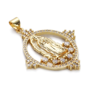 Detailed macro of 14K gold plated Virgin Mary pendant with sparkling zircon setting