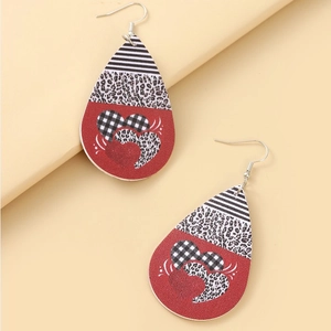 Red teardrop heart earrings with leopard print and stripe patterns on a beige background