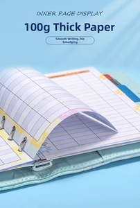 Inner page display showing 100g thick grid paper and metal ring binder of A7 notebook