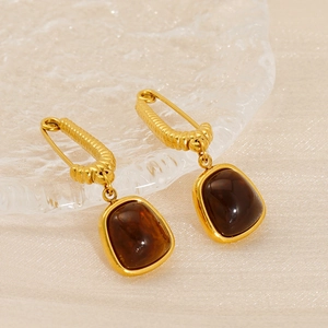 Boucles d'oreilles élégantes en acier plaqué or 18 carats avec pendentifs en pierre ambre