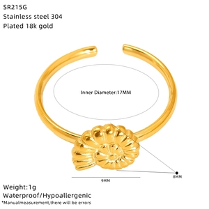 Detail view of 18K gold plated stainless steel bow ring with size and weight specs