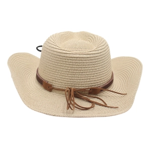 Detail of hand-woven straw cowboy hat featuring brown leather band and wide curved brim