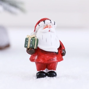 Nordic resin Santa Claus figurine with green gift box for Christmas desktop decoration