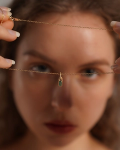 Elegant 18K gold plated S925 silver necklace featuring a rectangular green gemstone pendant