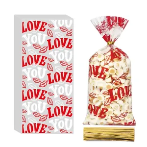 Valentine's Day cellophane candy bags with red LOVE YOU prints and gold twist ties