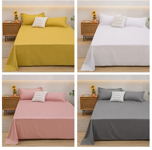 Detail view of washed cotton bedding set in ginger, white, pink and dark grey colors