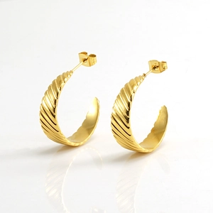 Classic gold twisted U-shape hoop earrings with a spiral texture design in polished steel