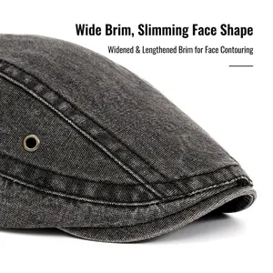 Vintage washed canvas newsboy hat in dark grey with wide brim and retro stitch detail