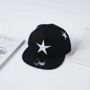 Detail of black snapback cap featuring white star embroidery and flat brim design