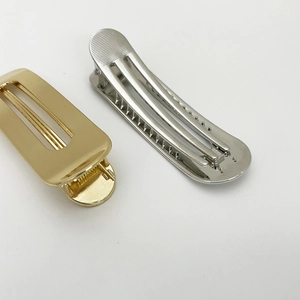 Punk style alloy duckbill hair clips in gold and silver finish with sleek metal texture