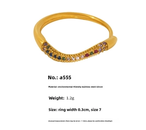 Detail view of 18k gold plated wave ring with multi-color cubic zirconia stones