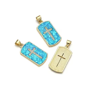 Gold dog tag pendant with blue opal inlay and sparkling cross detail for hip hop style