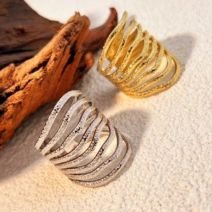 Vintage irregular textured wavy stainless steel spiral rings in gold and silver finish