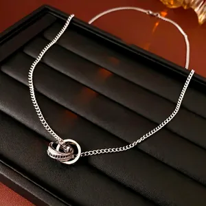 Interlocked double ring necklace in silver with black pave crystals and smooth finish