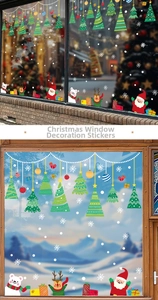 Detailed Christmas window stickers with Santa, reindeer, and snowflakes on glass display