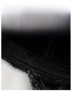 Close-up of winter flat cap showing widened sweatband and thick warm faux fur lining