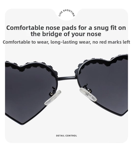 Detailed close-up of soft silicone nose pads on heart-shaped polarized kids sunglasses