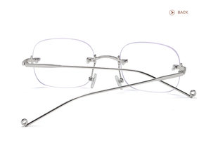 Back view of frameless sunglasses with silver metal temples and rectangular lenses