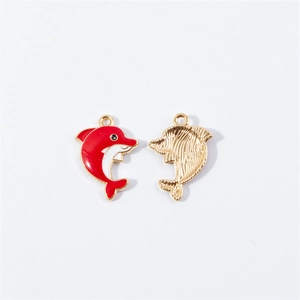 Front and back detail of dolphin pendants in red enamel and gold-plated alloy