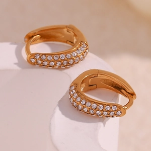 Close-up of 18K gold plated hoop earrings with micro-paved white zircons in detail