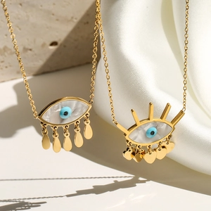 Chic gold titanium steel devil eye pendant necklace with blue eye and tassel detail