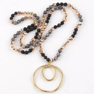 Bohemian sweater chain with natural semi-precious stones and golden double-ring pendant
