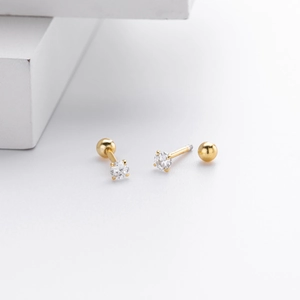 Detailed close-up of gold S925 sterling silver screw back earrings with round cubic zirconia