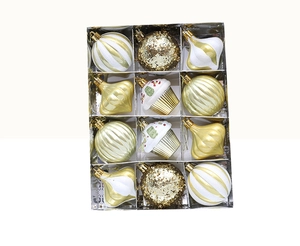 Set of 12 gold and white Christmas ornaments including glitter baubles and cupcake shapes