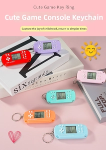 Detailed view of colorful mini handheld game consoles with keychains in six vibrant colors