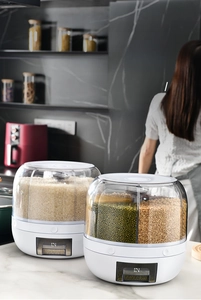 Detail view of rotating grain dispenser with transparent compartments and drawer storage