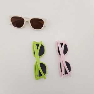 Retro square kids sunglasses in beige, green, and pink with silver star decor