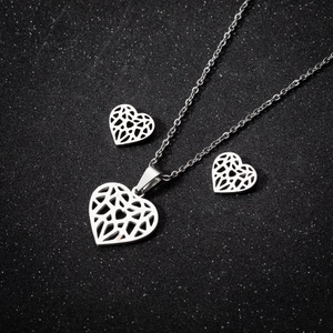 Silver geometric hollow heart jewelry set with pendant necklace and matching stud earrings