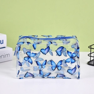 Trousse cosmétique en PVC transparent étanche avec motif papillon bleu et fermeture éclair